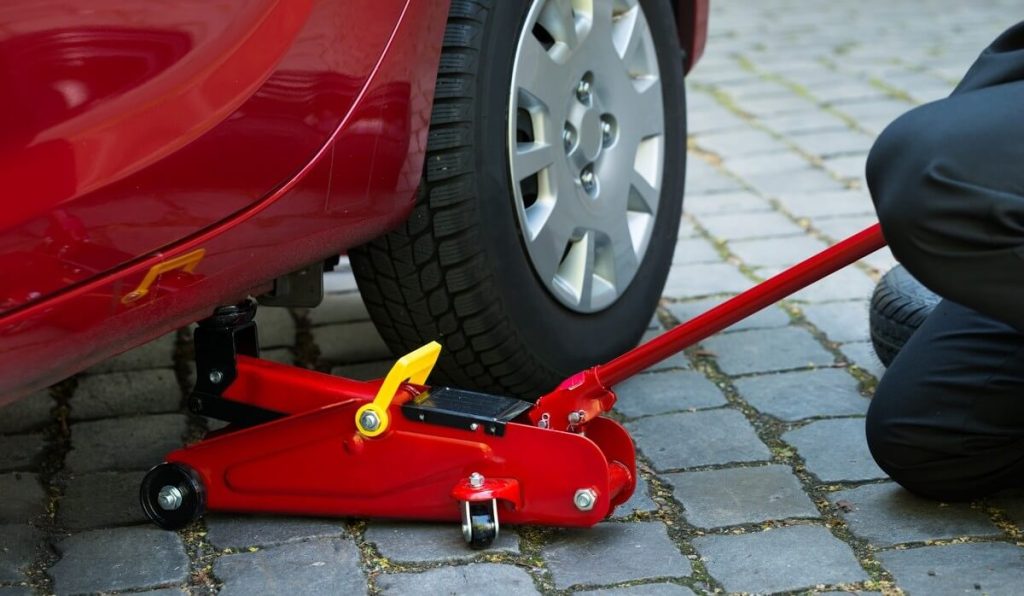 Red portable car jack